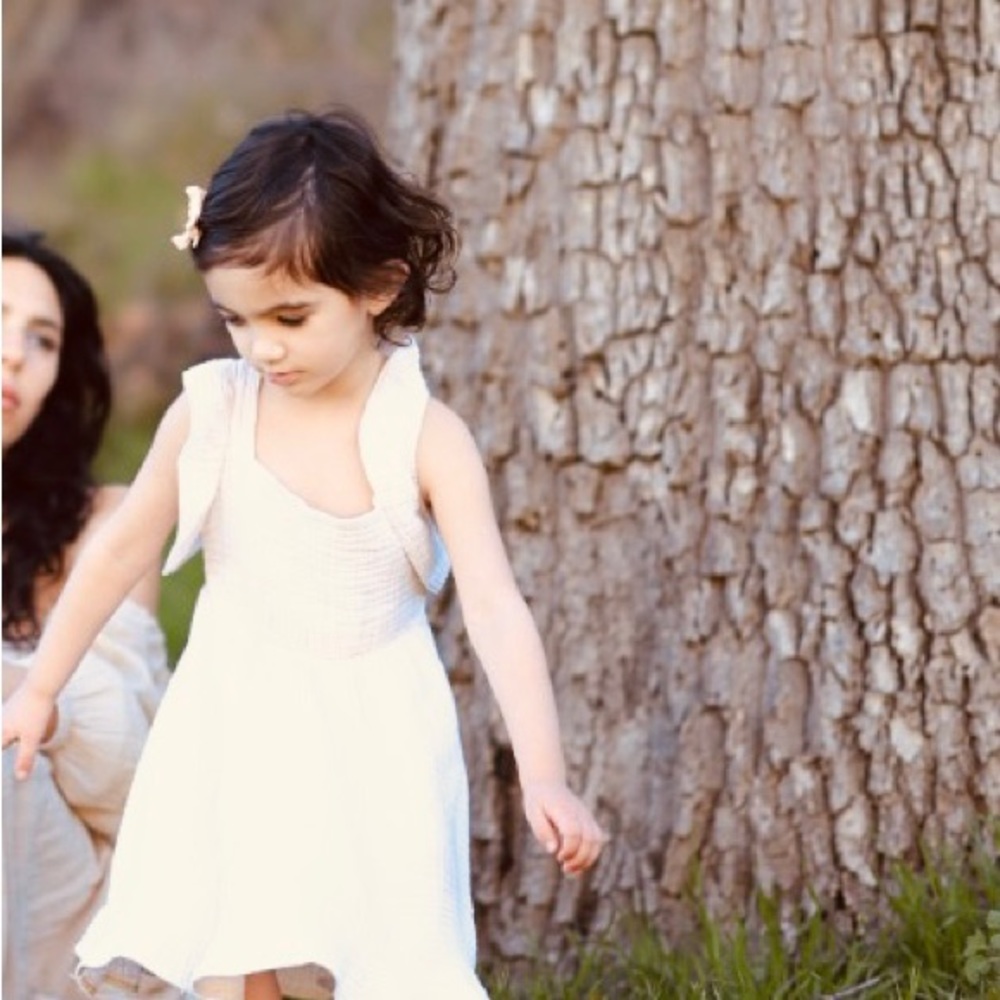 Romi’s white dress